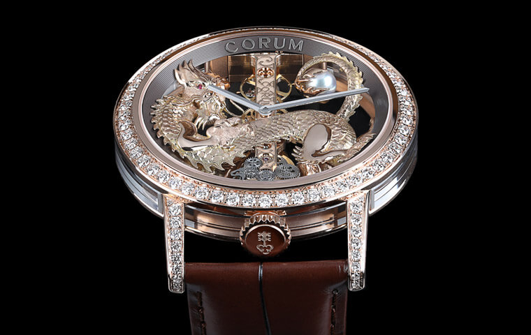 崑崙首次為金橋圓形錶添上祥龍金雕